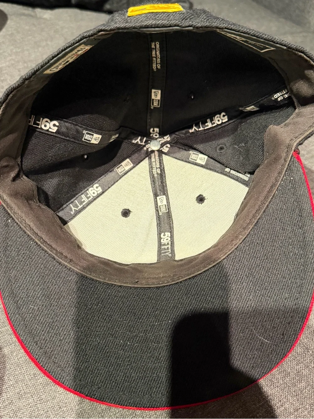 New Era Black Cap with Red Brim and Yellow Logo